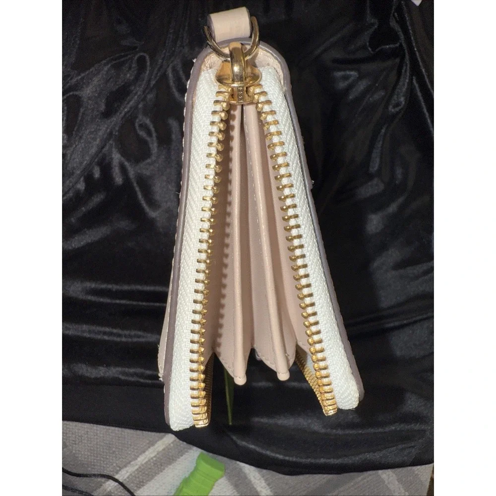 KATE SPADE large zip around white and tan wallet brand new